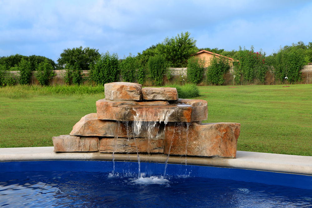 cascada de piedra artificial para piscina